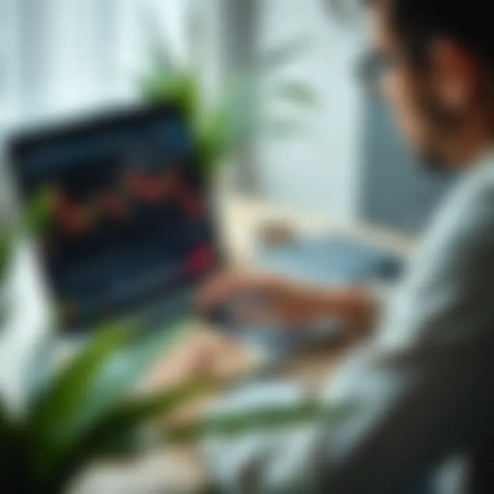 Person studying forex trading videos on a laptop with notes and a cup of coffee