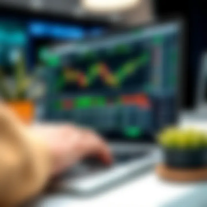 User interacting with a laptop showing binary options demo account interface and trading tools